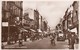 Postcard High Street Cheltenham Animated Shops People Cars Bicycles RP My Ref  B12888 - Cheltenham