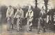 CARTE-PHOTO- A SITUER- GROUPE DE PERSONNE A VELOS - Carnaval