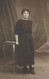 CPA Carte Photo Une FEMME LADY FRAU  Avec Des Chaussures à Ruban Souriant Au Photographe PRILLOT De METZ - Te Identificeren