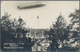 Zeppelinpost Deutschland: 1929. Real Photo Postcard (RPPC) Showing The Graf Zeppelin Airship Flying - Poste Aérienne & Zeppelin