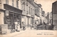 C P S M   76 Seine Maritime Auffay La Rue De La Nation épicerie Pub Naphta Moto Carte Animée - Auffay