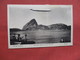 The Graf Zeppelin Over The Bay  Rio De Janeiro  Brazil -------Scotch Tape On Top Border   Ref    3554 - Dirigibili