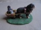 Statuette De Chien - St Bernard Et Son Chiot Dans Une Charrette - Animals