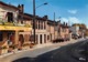 BRUGUIERES - La Rue Principale Et Le Café Du Virage - Snack-Bar - Automobile - Renault 4l - Other & Unclassified