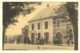 A0889	[Postkaart] Bastogne / Un Coin Du Carré. Route D’Arlon (Nels, Schumacher) [café Naftpomp Pierre Delperdange] - Bastenaken