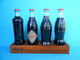 CROATIAN ISSUE ... COCA-COLA 125. YEARS - Full Set Of 4. Glass Bottles * FULL UNOPENED BOTTLES ON A SPECIAL RACK - Flaschen