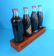 Delcampe - CROATIAN ISSUE ... COCA-COLA 125. YEARS - Full Set Of 4. Glass Bottles * FULL UNOPENED BOTTLES ON A SPECIAL RACK - Bottles