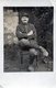 Carte Photo D'un Garde Champêtre Portant Des Sabot Posant Assis A La Campagne En 1916 - Identified Persons