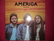 LP N°2253 - AMERICA - HOMECOMING - GRAND GROUPE - 45 T - Maxi-Single