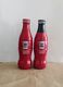 AC - COCA COLA HEARTH ILLUSTRATED SUGARLESS & ORIGINAL TASTE SHRINK WRAPPED 2 EMPTY GLASS BOTTLES & CROWN CAPSES & C - Bottiglie