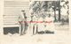 313425-Black Americana, RPPC, Family Eating Watermelon Outside A House, Photo - Black Americana