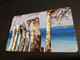 NOUVELLE CALEDONIA  CHIP CARD 25  UNITS  CARVED TREES AT BEACH         ** 4193 ** - Neukaledonien