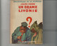 Livre- Jules VERNE - Un DRAME En LIVONIE (édit. Hachette; Bibliothèque De La Jeunesse) Jaquette, Rabats Intacts - Bibliotheque De La Jeunesse