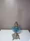 Delcampe - Ancienne Lampe A Pétrole Unis France Paris Réservoir En Verre Bleu, Pied Floral, Haut  49 Cm Poids 1010 Grammes - Luminaires & Lustres