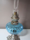 Delcampe - Ancienne Lampe A Pétrole Unis France Paris Réservoir En Verre Bleu, Pied Floral, Haut  49 Cm Poids 1010 Grammes - Luminaires & Lustres