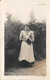 Thème Carte Postale  A Identifier : Une Femme  Dans Un Jardin    Calvados..   (voir Scan) - Photographs