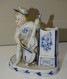 Delcampe - ANCIEN SUJET PORCELAINE PYROGENE PORTE ALLUMETTES Musicien Violoncelle Vitrine Collection Déco - Luciferhouders