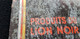 Plaque Publitaire En Carton Du  LION NOIR Produits Les Plus économique  Illustration Fauve Et Boite Ronde Lettres - Plaques En Carton