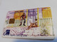 St MAARTEN $10  Nafls 17.70 ,- ST MAARTEN Man On Veranda 60 Units  ** 6753** - Antilles (Netherlands)