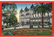 (RECTO / VERSO) MONTE CARLO EN 1912 - HOTEL DE PARIS AVEC PERSONNAGES - BEAU CACHET - CPA COULEUR - Hotels