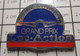 1718c Pin's Pins / Beau Et Rare / THEME SPORTS / GRAND PRIX LOC-ACTION VOLANT DE VOITURE - Automobile - F1