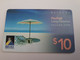 BERMUDA  $10,-,-NORTH ROCK   BERMUDA / PARASOL ON BEACH /  DIFFERENT BACK/   PREPAID CARD  Fine USED  **11271** - Bermuda