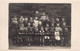 CPA - Photographie - Ecole - Classe D'enfants En Uniforme Avec Leur Institutrice - Gruppen Von Kindern Und Familien