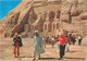 Postcard Egypt Abu Simbel Rock Temple Of Ramses II Gigantic Statues Partial View Ethnic Types And Scenes Tourists - Temples D'Abou Simbel