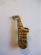 Petit Insigne Musical / Saxophone / Bronze Doré / Vers 1950 - 1970           BIJ164 - Brochen