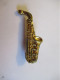 Petit Insigne Musical / Saxophone / Bronze Doré / Vers 1950 - 1970           BIJ164 - Broches