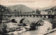 FRANCE - Environs Du VIGAN - Vue Du Pont De Lacroix - Village - Rivière - Pont - Tours - Animé  - Carte Postale Ancienne - Le Vigan