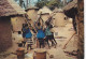 AK149019 AFRICA In Pictures - A Group Of Women Grinding For Food - Non Classés