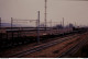 Photo Diapo Diapositive Slide Wagons Marchandises Plat Chargé Et Train Corail Diesel 72000 SNCF En 03/1988 VOIR ZOOM - Diapositives