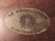 Ancienne Plaque Publicitaire Laiton Émaillé Invitation Le Drugstorien Drugstore Des Champs-Élysées Ca1970 - Blechschilder (ab 1960)