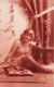 CARTE PHOTO - Portrait - Femme Assise Sur Un Tapis - Colorisé - Carte Postale Ancienne - Photographie