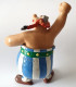 FIGURINE ASTERIX BULLY 1984 OBELIX VA METTRE UBE CHATAIGNE BE - Asterix & Obelix