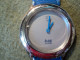 MONTRE PUBLICITAIRE PEUGEOT 106 KID. GENUINE LEATHER. ANNEES 90 / 2000 - Reclamehorloges