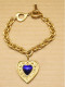 -BRACELET BRELOQUE COEUR YVES SAINT LAURENT Années 90 Métal Doré Résine Bleue    E - Armbänder