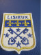 Ecusson Tissu Ancien / LISIEUX /Calvados / Normandie/  Vers 1970-1990                    ET503 - Blazoenen (textiel)