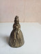 Cloche Du XIXème En Bronze Doré Figurine Hauteur 11 Cm - Cloches