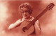 CARTE PHOTO - Portrait D'une Femme Tenant Une Guitare -  Carte Postale Ancienne - Fotografie