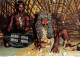 AFRICAN LIFE - Inside His Reed Hut A Sangoma ....prepares To Read The Future In A Throw Of Shells - Sud Africa