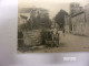 COULONGES SUR L'AUTISE (Deux Sèvres) LA RUE DE L'EGLISE LA FONTAINE APPRIVISIONNEMENT EN EAU ATTELAGE CITERNE - Coulonges-sur-l'Autize