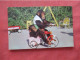 Riding A Tricycle.    MONKEY JUNGLE Near MIAMI FL.    Ref 6234 - Singes