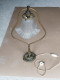 UNE LAMPE A POSER EN BRONZE ET LAITON - Lantaarns & Kroonluchters