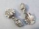 BOUCLES D'OREILLES TORTUES EN METAL ARGENTE - Earrings