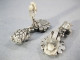 Delcampe - BOUCLES D'OREILLES TORTUES EN METAL ARGENTE - Boucles D'oreilles