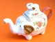 Delcampe - Théière  Porcelaine Blanche à Décor De Pivoines  Forme éléphant - Teapots