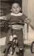 CARTE PHOTO - Un Petit Garçon Sur Une Bicyclette - Carte Postale Ancienne - Photographie