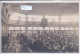 CARTE-PHOTO- A IDENTIFIER- BANQUET A L INTERIEUR D UNE HALLE- OU ?- MARQUEE CROSIER AU DOS - Da Identificare